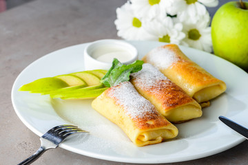 Sweet dessert pancakes blinis with apples