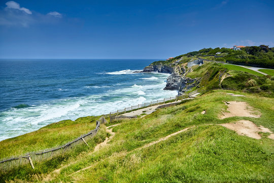 Pointe Saint Barbe of Saint jean de Luz, Basque Country. Atlantic Coast. Coastline, ocean waves, hill, green grass and pathway. Commune in the Pyrenees-Atlantiques department in south-western France