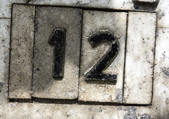 Written Wording in Distressed State Typography Found Number Twelve 12