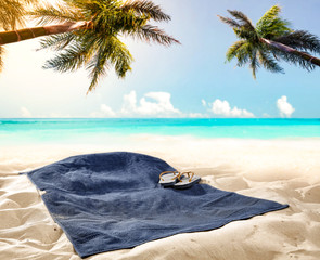 Fototapeta na wymiar towel background on beach and free space for your decoration. 