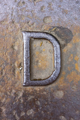 Written Wording in Distressed State Typography Found Letter D
