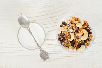 Cup of yogurt with granola. Healthy breakfast. Top view