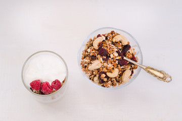 Cup of yogurt and granola bowl. Healthy breakfast. Top view