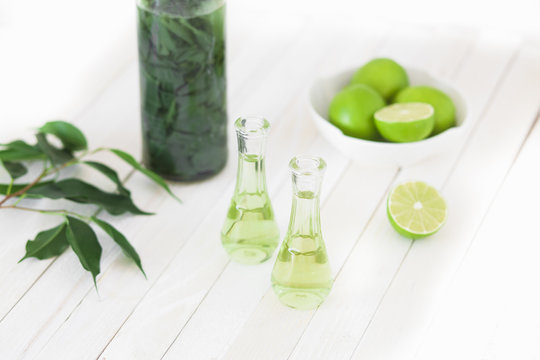 Herbal brandy with healty leafs and lime