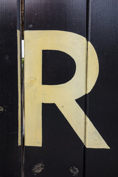 Written Wording in Distressed State Typography Found Letter R