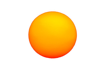 The Sun with sunspots visible as dark spots Isolated over white background
