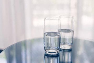 Two glasses of mineral water on the table 