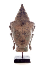 Traditional Buddha head statue. Meditating buddha with serene mindful expression