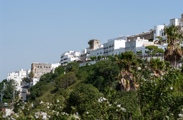 Obraz premium View of the city of Vejer de la Frontera (Cadiz, Spain), it is seen on top of the hill. Summer of 2016.