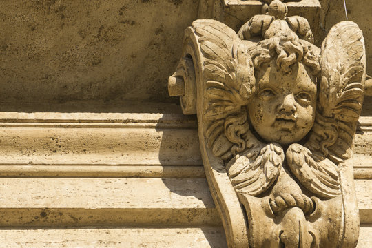 Carved Cherub Detail On An Historic Building