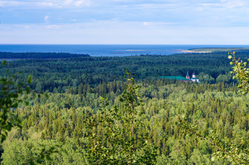 View on Savvatiy hermitage from Holy Ascension Skete with Sekirnaya mountains on Solovki