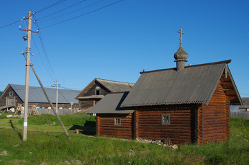 Fototapeta na wymiar SOLOVKI, REPUBLIC OF KARELIA, RUSSIA - August, 2017: Wooden Chapel on the Great Solovetsky Island