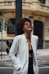 Beautiful girl for afro in the streets of Madrid Spain.