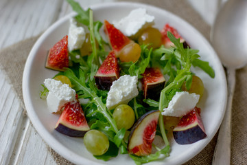 Beautiful vegetarian salad with goat cheese and figs.