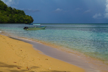 Fototapeta na wymiar A beautiful and pristine beach in small remote island