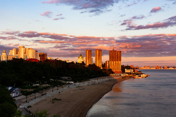 Fototapeta premium Sunset over the city of Khabarovsk and the river Amur.