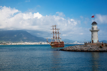 medieval wooden ship and lighthouse in Turkey