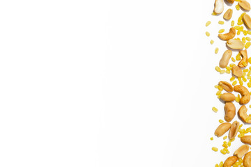 Pattern of nuts mix with copy space. Various nuts isolated on white.  peanuts, cashew nut, green beans.  Top view or flat-lay. Isolated on white background.