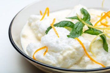 close up of delicious floating island dessert