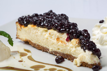 close up of delicious cheese cake with forest fruits