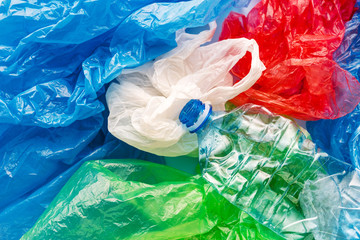 Pile of colorful plastic bags and bottle