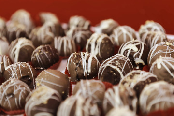 Set of cupcakes around a wedding table. A cupcake is a small cake designed to serve one person and uses ingredients as butter, sugar, eggs, and flour, as well as raisins, nuts, or chocolate chips.