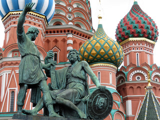 Fototapeta na wymiar Monument to Minin and Pozharsky and St. Basil's Cathedral on Red Square in Moscow. Russian tourist landmark