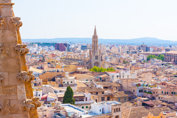 View over the rooftops and the Church of Santa Eulalia from  the terrace of the Cathedral of Santa Maria of Palma, also known as La Seu. Palma, Majorca, Spain