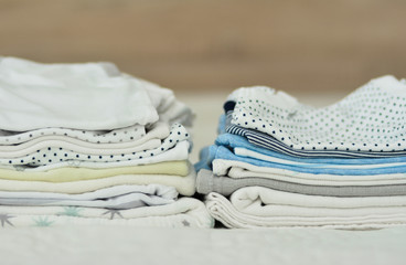 Folded clothes for a newborn boy