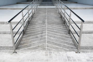 ramp for the wheelchair and stairs for normal people adjoining