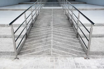 Fotobehang ramp for the wheelchair and stairs for normal people adjoining © phanasitti