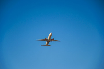 take off, cruising or landing of some airline aircraift in air, nearby airport, huge and safe option of transport, safest traveling