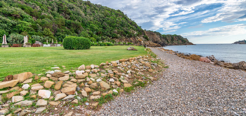 Coast of Punta Ala in Tuscany on a cloudy summer day