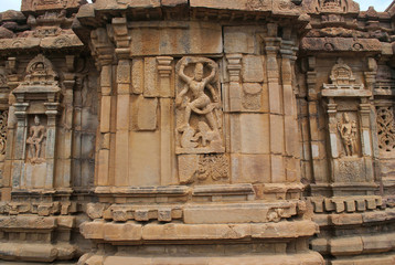 Fototapeta na wymiar Pillared dev-koshthas on the southern mukha mandapa depicting figures of Shiva, Mallikarjuna Temple, Pattadakal temple complex, Pattadakal, Karnataka