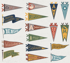 Fototapeta premium Set of adventure, outdoors, camping colorful pennants. Retro labels on textured background. Hand drawn wanderlust style. Pennant travel flags design