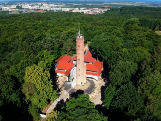 Observation and telecommunications tower in the forest, aerial view