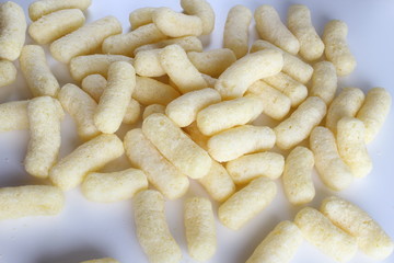 corn sticks on white background