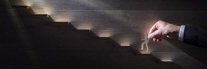 Wide panorama image of a businessman climbing the corporate ladder © Gajus
