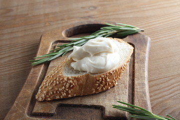 processed cheese bread on a wooden background