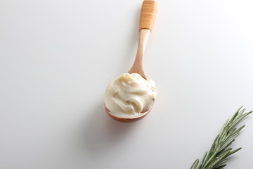 processed cheese in a spoon background