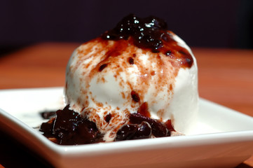 Ice cream is served with gooseberry jam for dessert
