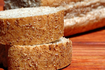 Rye bread is served on wooden background