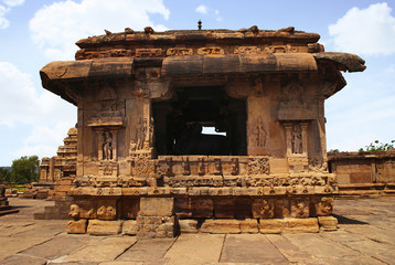 View of Nandi mandapa, Virupaksha temple, Pattadakal temple complex, Pattadakal, Karnataka. View from south. Note the beautiful carvings on the exterior wall.