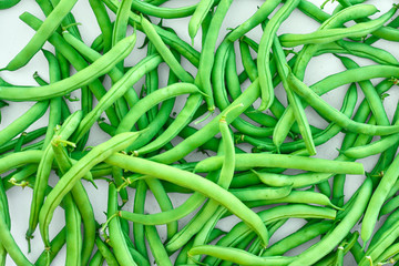 Pile of green beans, photographed on blurred background, natural fresh product