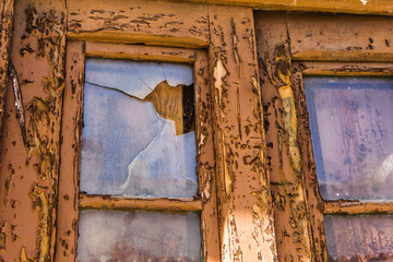 Old window with broken glass.