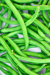 Pile of green beans, photographed on blurred background, natural fresh product