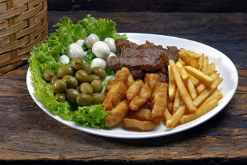 Plate with Assorted Appetizers, Olive, Meat, Quail Egg, French Fries