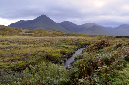 Beautiful Scottish Countryside With Mountains And Fields