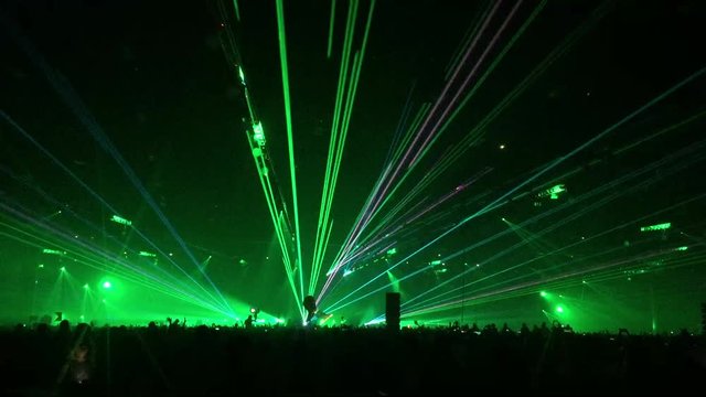 Laser lights at electronic music rave concert