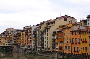 Fototapeta na wymiar Colorful houses near the Arno River, in Florence, Italy